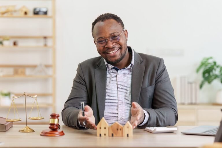 American African Lawyer or Real Estate Agent explain insurance detail to client, to legally for the purchase, mortgage and rental of real estate.